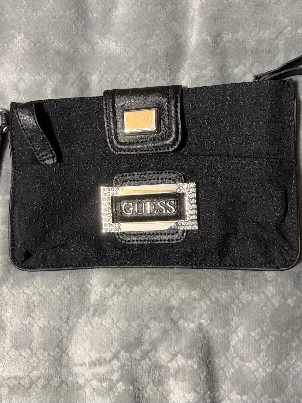 GUESS Black Wristlet Clutch with Silver Rhinestone Logo Plaque